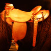 Douglas 38 Wade - tree by Rick Reed, 15 and 1/4 inch seat, Gullet - 7 and 1/2 inch by 6 and 1/4 inch by 4 inch, Horn 3 inch round, 90 degree bars, 7/8ths flat palte riggin, Cheyenne Roll, Sheridan Style Floral Carving bordered with Vaquero Lace.